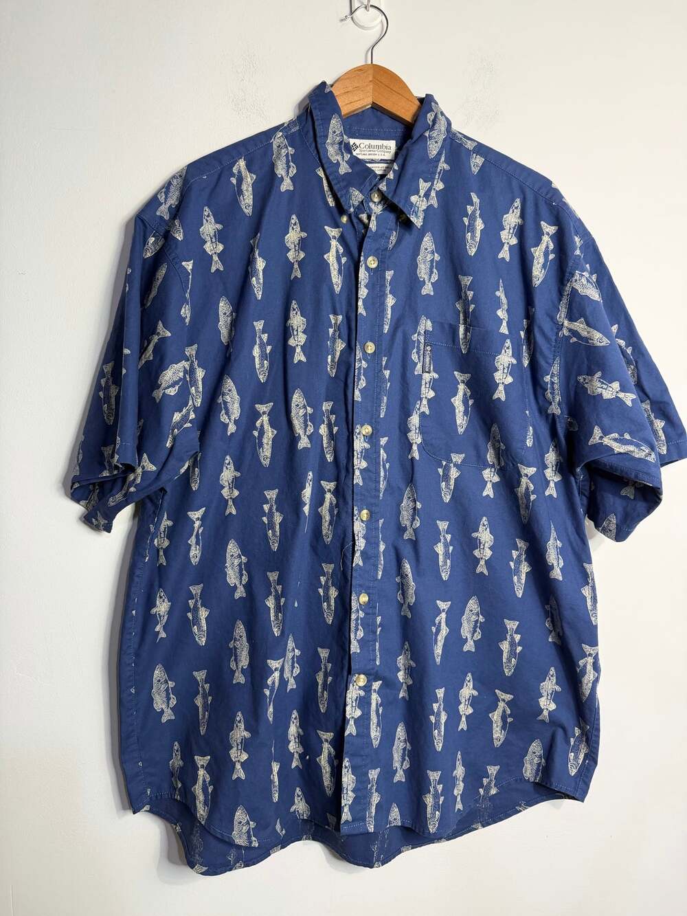Columbia Sportswear short-sleeve button-up in a blue all-over fish pattern